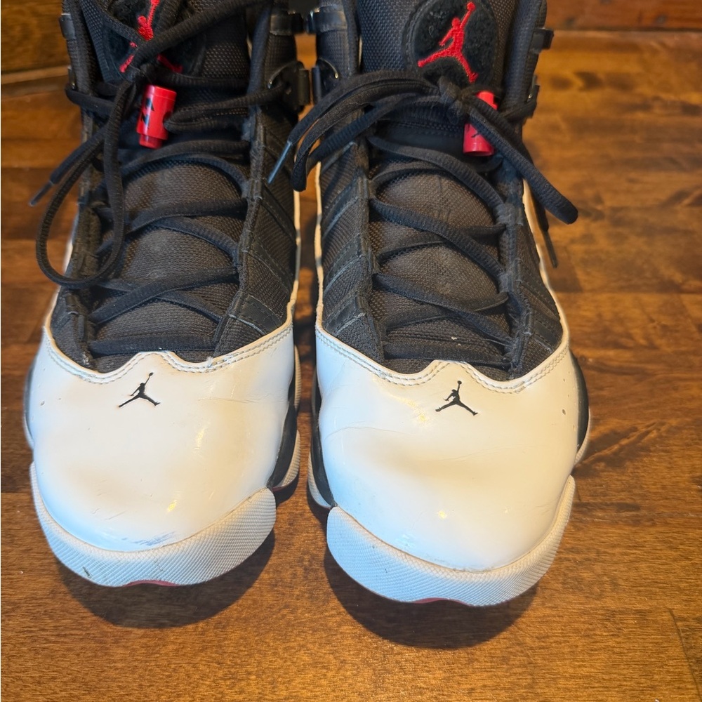 Jordan Kids Black and White Sneakers with Red Accents